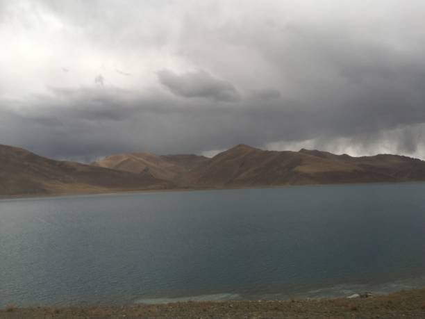 istock Lake Yamdrok on Cloudy Spring Day in Tibet, China. 968137636
