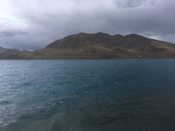 istock Lake Yamdrok on Cloudy Spring Day in Tibet, China. 968137762