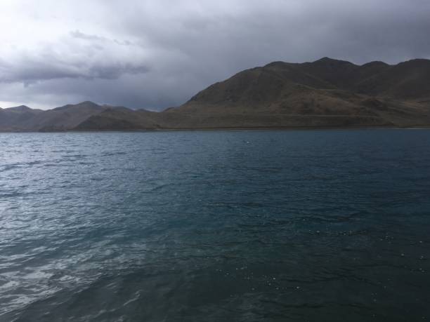 istock Lake Yamdrok on Cloudy Spring Day in Tibet, China. 968137766
