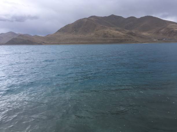 istock Lake Yamdrok on Cloudy Spring Day in Tibet, China. 968137770