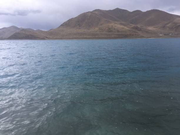 istock Lake Yamdrok on Cloudy Spring Day in Tibet, China. 968137774