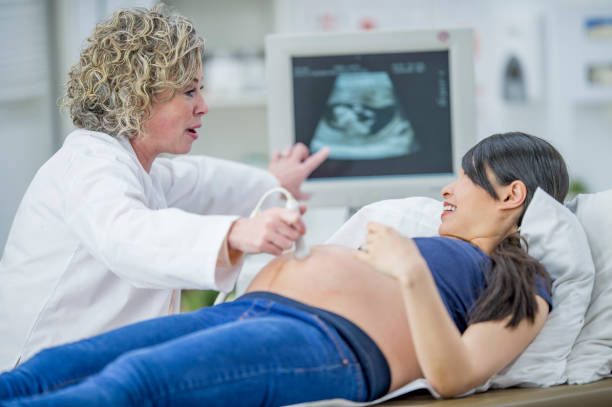 istock Doctor Showing An Ultrasound 968176622