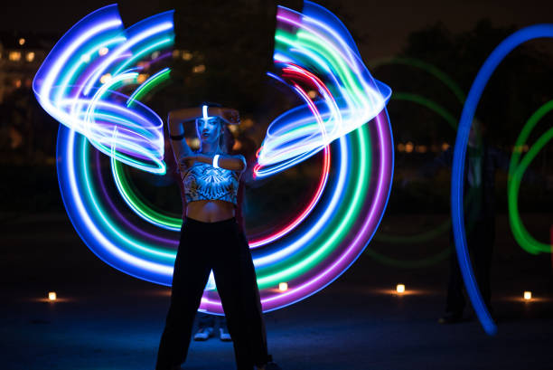 istock Girl at night with light painting 968191742