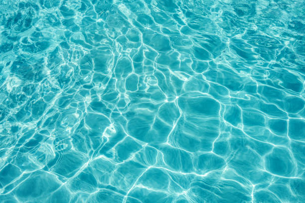 istock Background of clear turquoise water. 968197184