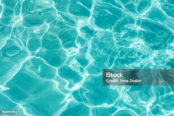 Background Of Clear Turquoise Water Stock Photo - Download Image Now - Water, Swimming Pool, Sea