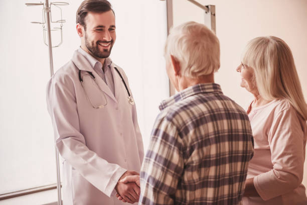 istock Old couple and doctor 968210128