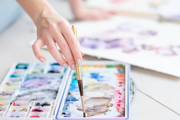 istock art painting class hobby hand mixing watercolors 968244970