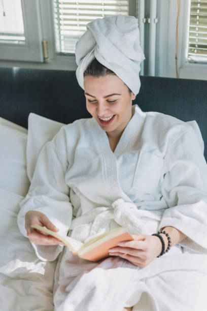 istock Relaxing on the bed at home 968248134