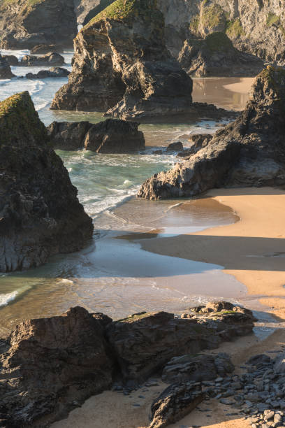 istock Stunning dusk sunset landscape image of Bedruthan Steps on West Cornwall coast in England 968253784