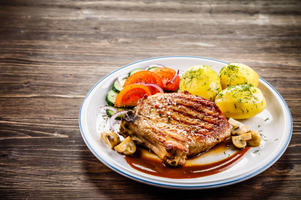 Grilled pork chop and vegetables