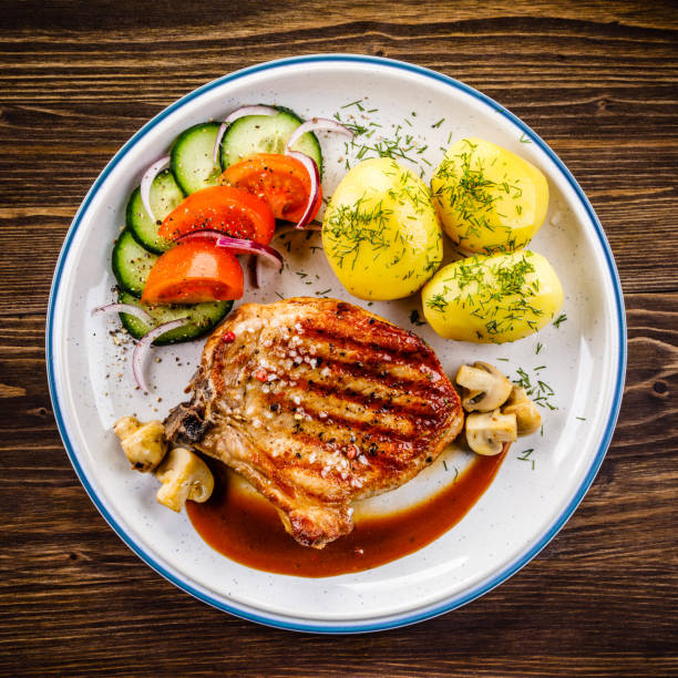 Grilled pork chop and vegetables