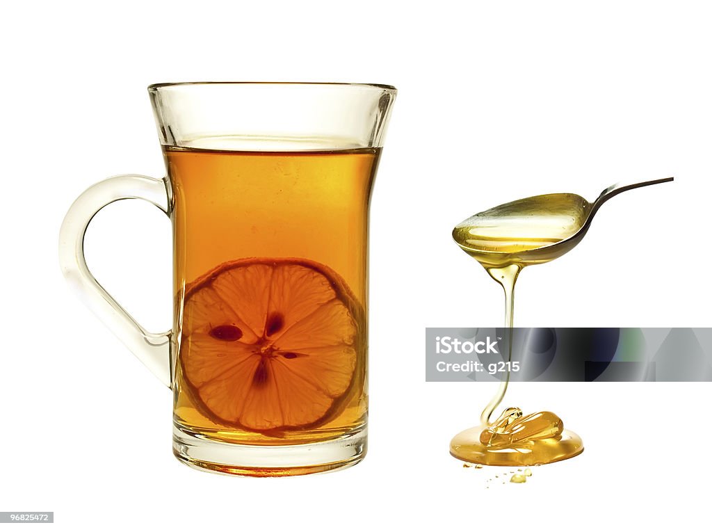 Cup of tea with lemon Cup of tea with lemon on a white background. Assistance Stock Photo