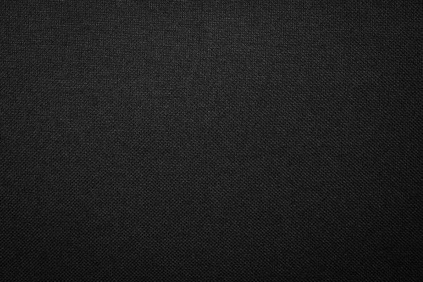istock Black fabric texture background. Dark clothing material. 968256998