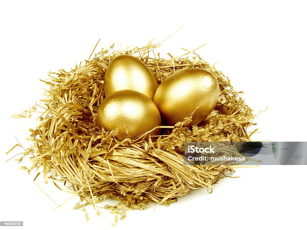 Gold in den golden nest egg - Lizenzfrei Auszeichnung Stock-Foto