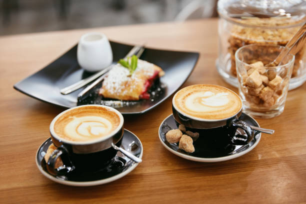 istock Cup Of Coffee Drink And Dessert On Plate In Cafe 968257536