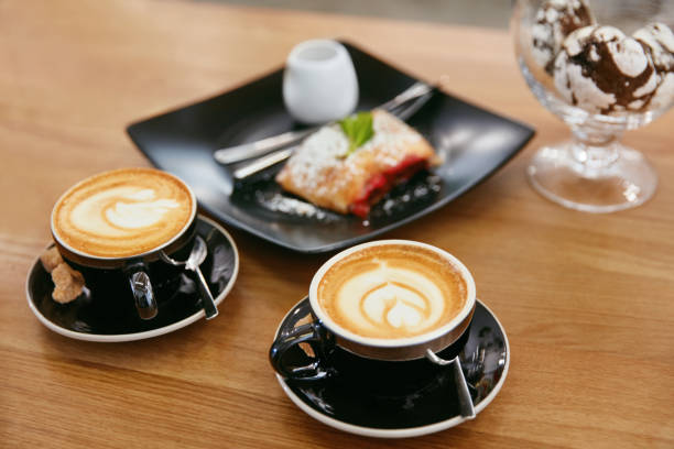 istock Cup Of Coffee Drink And Dessert On Plate In Cafe 968257714