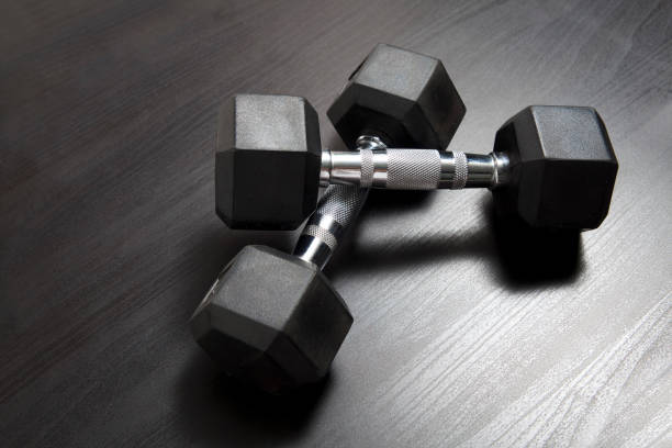istock Dumbbells for strong healthy body. 968266912