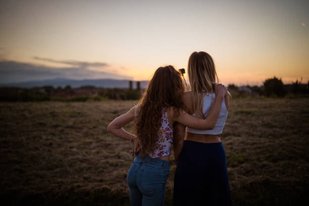 istock Female friends taking selfie at dusk 968269780