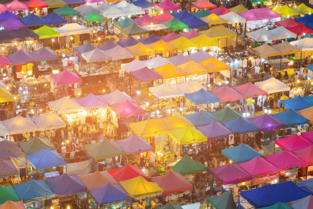 istock Night flea market roof multiple colour 968281986