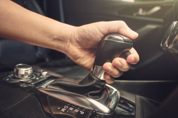 istock Asian Men handle hold to gear stick. 968282772