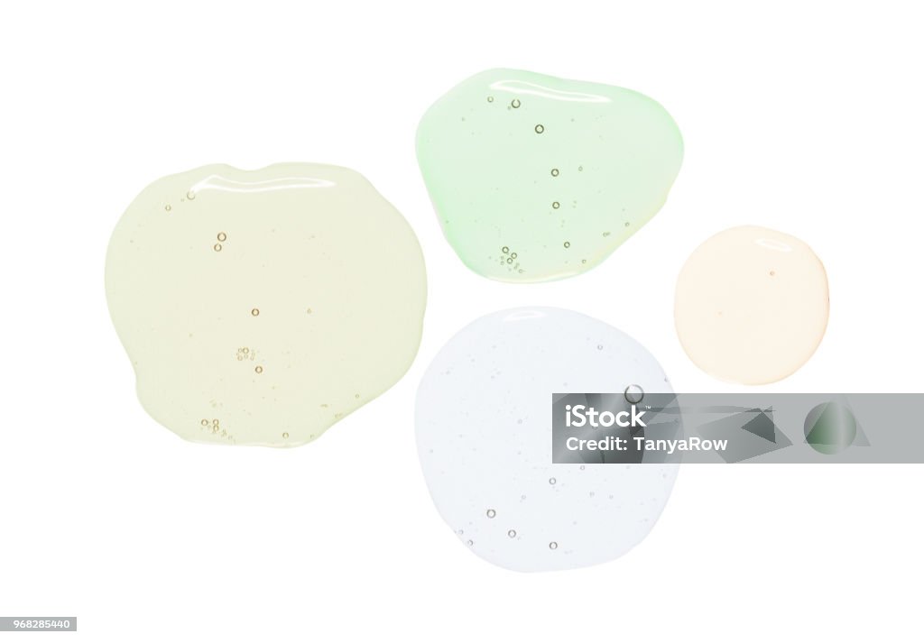 Hyaluronic Acid Cosmetic Cream Gel White Background Multi-coloured Cosmetic Gels And Creams with backgrounds Textured Stock Photo