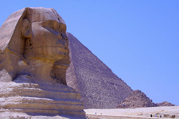 Historical colour photo, 90s of the Sphinx at the pyramids in Cairo with Cheops pyramid