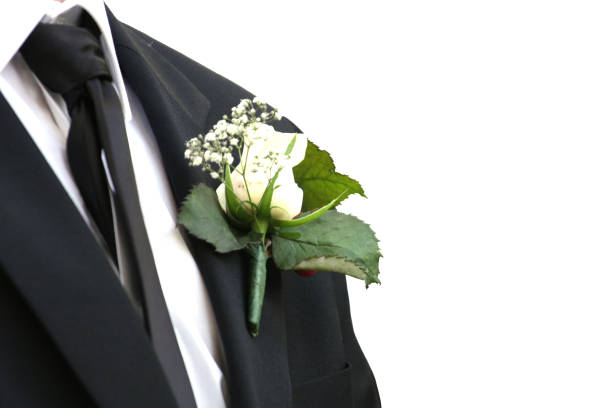istock Suit with black jacket, black tie and white shirt decorated with white rose 968325572
