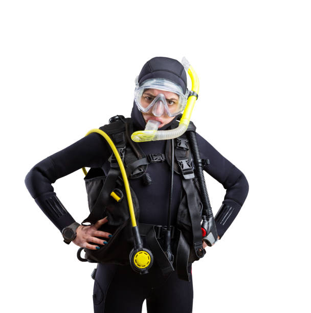 istock Diver in wetsuit and diving gear, white background 968332048