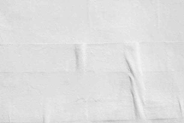 istock Blank old ripped torn paper crumpled creased posters grunge textures backdrop background 968341248