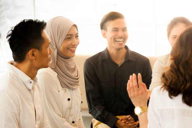 istock Business people having a team building session 968341426
