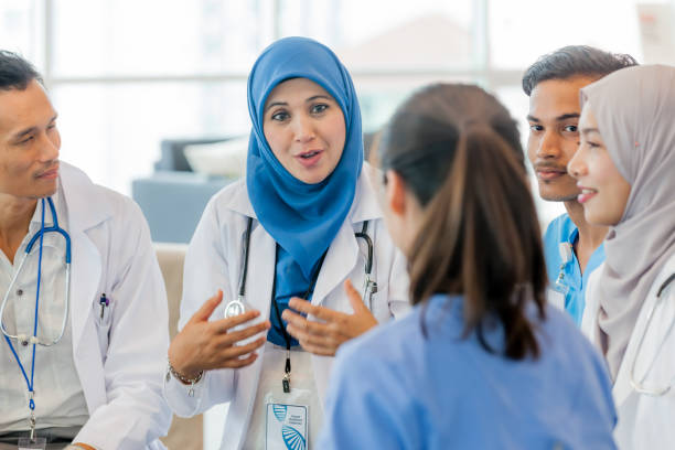 istock Discussion among doctors and nurse 968350584