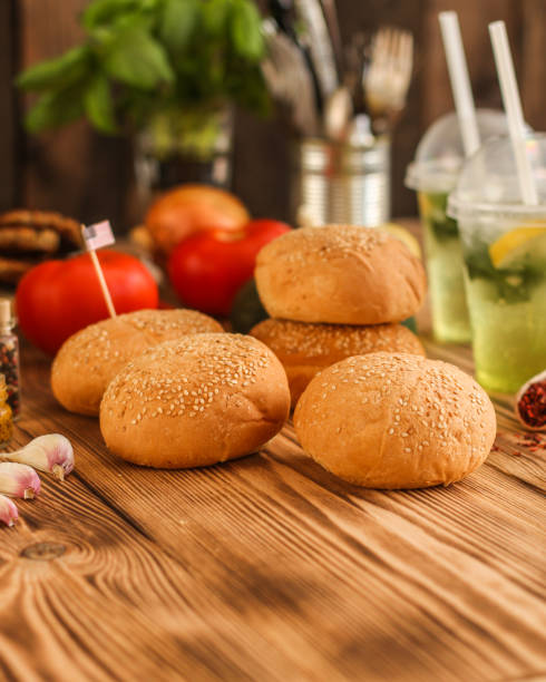 istock round buns with sesame -  bun pastries (sandwich) - cuisine.  Food background 968353284
