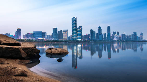 istock City skyline under sunset sky, Nanchang, China 968359558