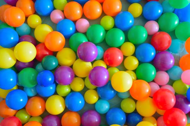 istock Background texture of colorful plastic balls 968359988