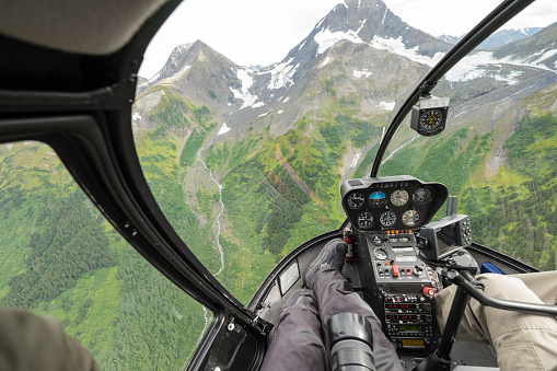 helicopter ride to glacier snow mountain in alaska , usa