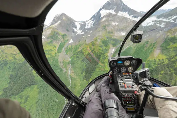 Photo of helicopter ride to glacier snow mountain in alaska , usa