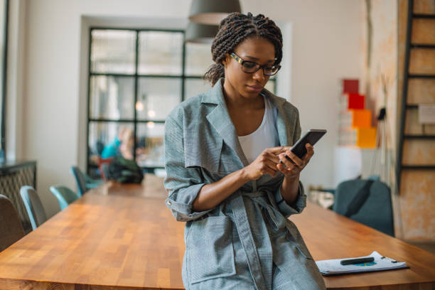 istock Portrait of a woman networking 968372422