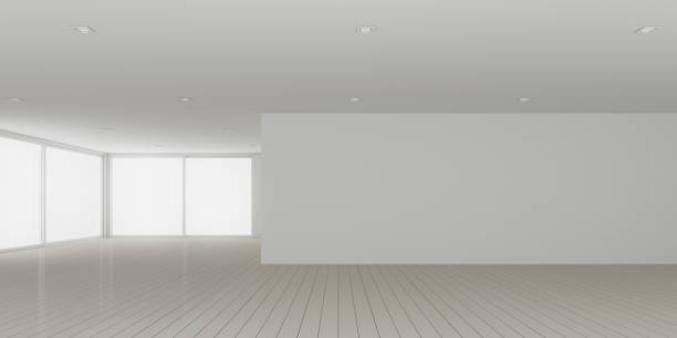 istock 3D rendering of white room space with interior lighting and sun light cast the window shadow on the wall and plank wood floor,Perspective of minimal design architecture 968373468