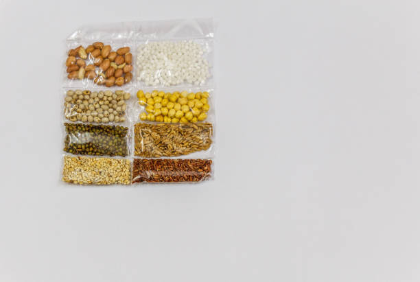 istock Smaller packets of Corn, Mustard, grams, Mung bean, ground nuts, Coriander 968377484