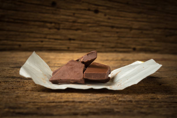 istock chocolate on wood. morning 968379842