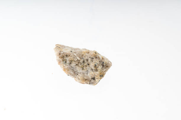 istock monozonitie granite mineral sample studio shot with white background 968383254
