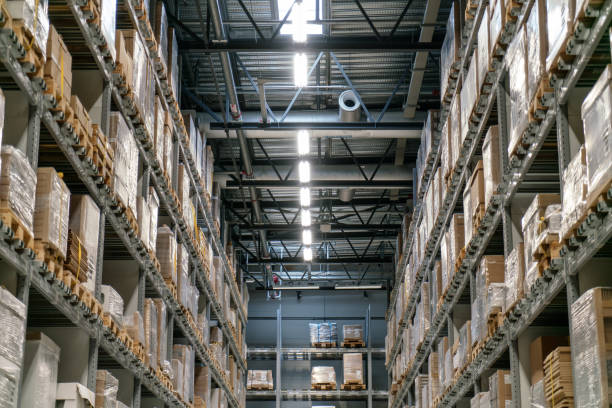 istock Industrial warehouses and shelves with boxes 968384050