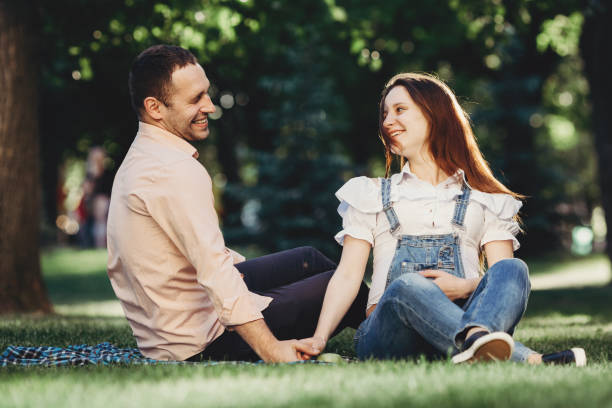 istock Happy pregnant couple enjoy time together 968391508