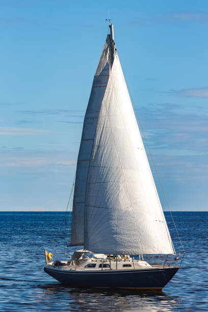 istock Blue sailboat at journey 968391762