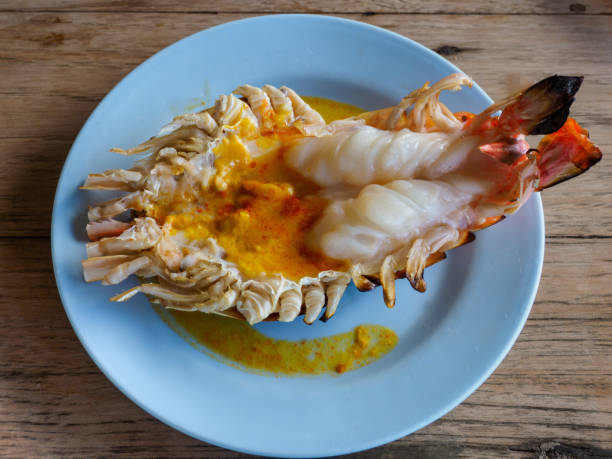 istock Grilled prawn on the blue plate 968395138