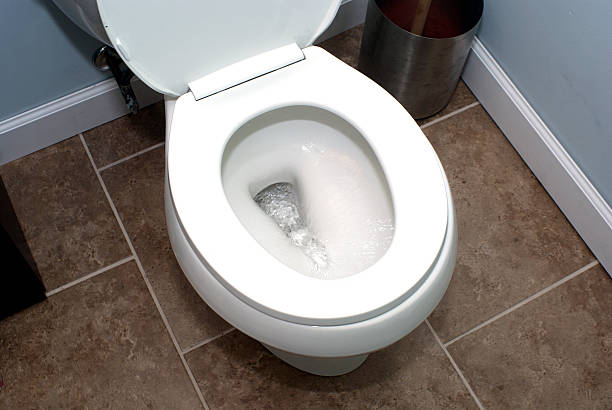 istock A white toilet flushing in the bathroom 96839737