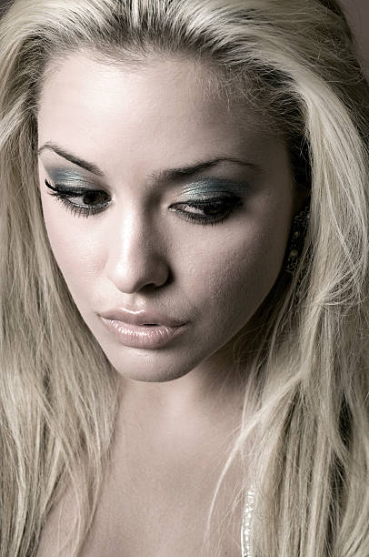 istock Beautiful Blonde Female Headshot Desaturated 96840059