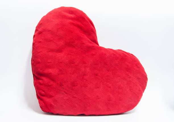 istock Red heart shape pillow on white background. 968412118