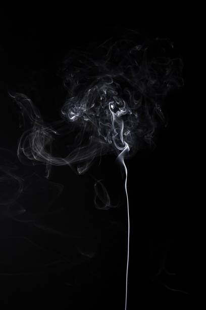 istock Vertical smoky waves of burning aromastick 968422004