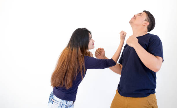 istock Angry Young couples quarrel on white background Bad relationship concept. 968425782